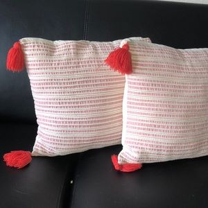 Cute pink/white stripped pillows w red tassles!